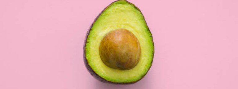 Avacado in pink background