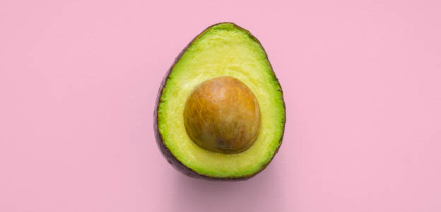 Avacado in pink background