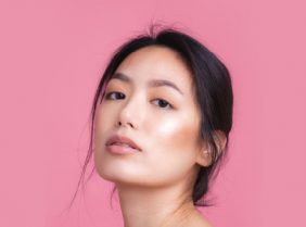 Asian Lady on pink background